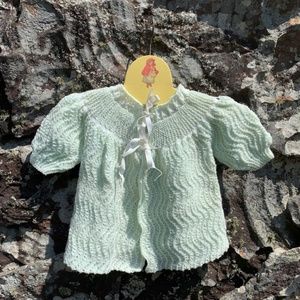 Hand crocheted infant sweater light mint green